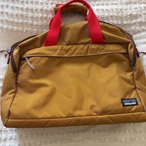 Patagonia Brown headway brief 22L Duffel Bag with Red Straps